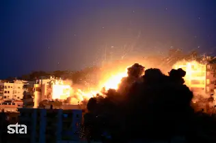 Izrael krepi napade na Bejrut in jug Libanona